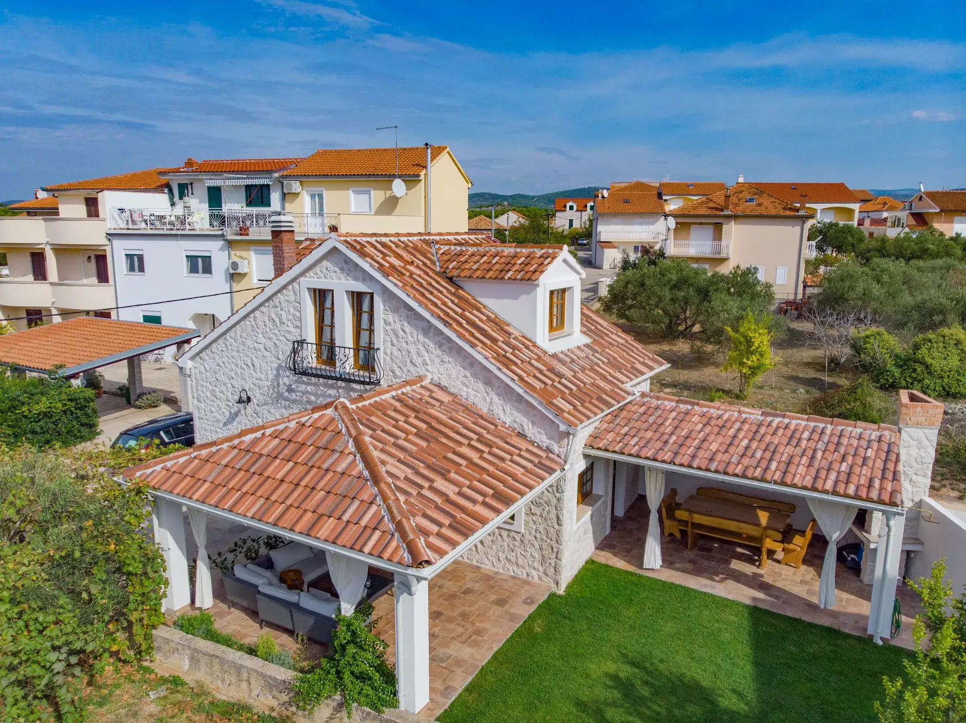 House Leila and the quiet Zablaće street seen from the air